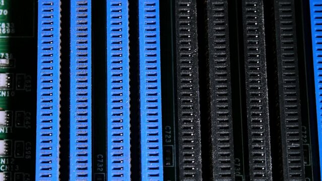 Close-up of a memory slots on a computer motherboard, hardware component concept