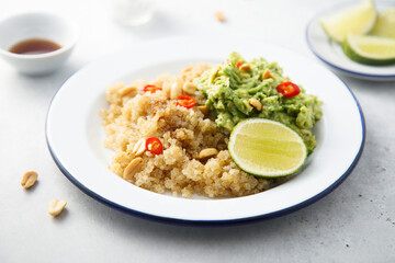 Healthy quinoa with mashed avocado