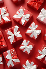 Red gift group with white ribbons on red background. Concept of celebration, anniversary, Christmas, Valentine and Love. Flat lay, top view, seamless abstract.