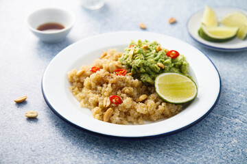 Healthy quinoa with mashed avocado