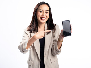 Naklejka premium A portrait of an Indonesian Asian woman wearing a cream-colored blazer, showcasing a blank smartphone screen. Isolated against a white background.