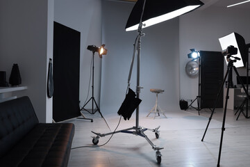 Casting call. Chair and different equipment in modern studio