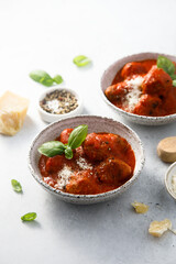 Homemade meatballs with tomato sauce and cheese
