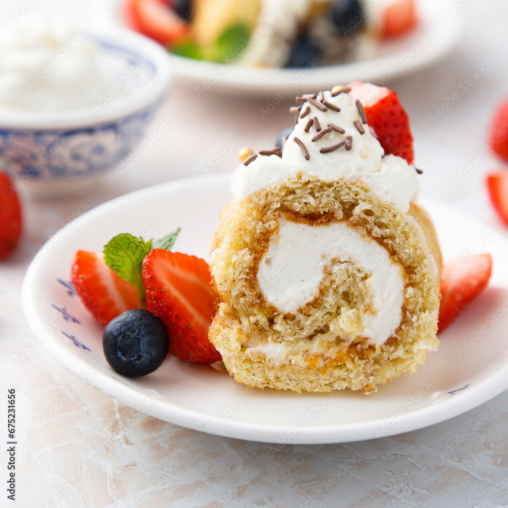 Sticker homemade swiss roll with whipped cream and berries