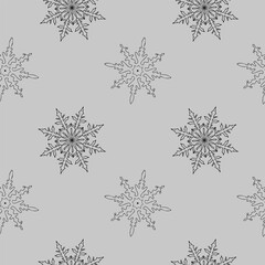 Seamless pattern of snowflakes. Decorative abstract illustration, hand-drawn. Ink on a color background. Ideal for creating postcards, packaging and web design.