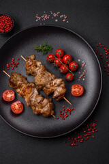 Delicious fried shish kebab of chicken or pork meat with salt, spices and herbs