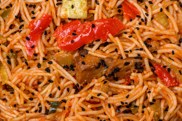 Delicious udon noodles with meat or seafood, vegetables, salt and spices