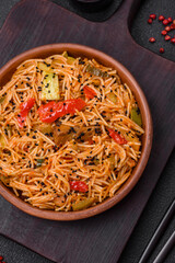 Delicious udon noodles with meat or seafood, vegetables, salt and spices