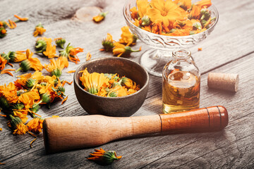 Calendula petals on the table. phytotherapy. - 675249286