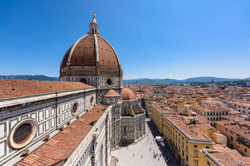 Fototapeta na wymiar Florence, Italy - June 28, 2023: View on cityscape and the dome of the Cathedral of Florence.