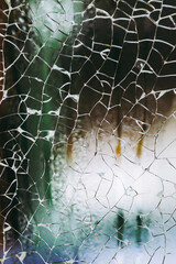 Arrière plan verre brisé éclaté sur une vitrine de magasin - Acte de vandalisme