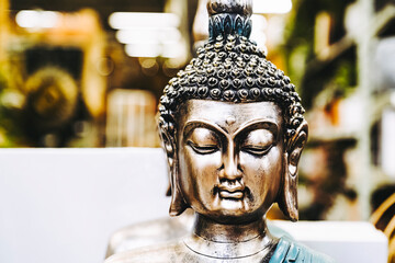 Statue visage du bouddha en bronze - Symbole de paix et sérénité	