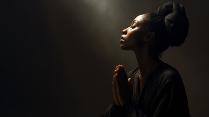 Spiritual black woman in prayer. The concept of deep faith - Powered by Adobe