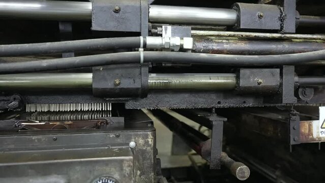 A mechanized line for the production of matches, where the blanks are sorted and the composition of the match head is skillfully applied to obtain a stable result.