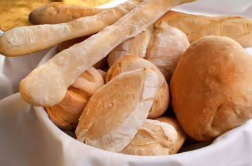 Italian food products, basket with some different wheat bread.