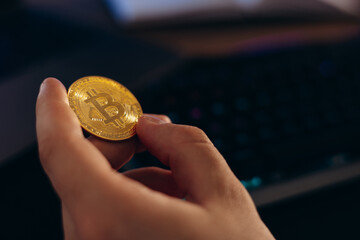 Man trader holding cryptocurrancy coins