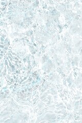 Defocus blurred transparent white colored clear calm water surface texture with splashes reflection. Trendy abstract nature background. Water waves in sunlight with copy space. Blue watercolor shine.
