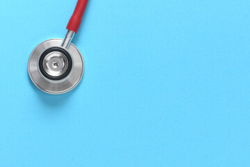 Stethoscope on blue background. Heart health, health insurance concept, world heart day, world...
