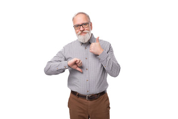 smart successful mature gray-haired office worker man with mustache and beard dressed in trousers and shirt