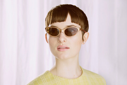 Young Woman Wearing Sunglasses
