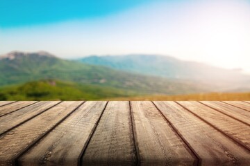 Empty blank wooden table on nature background.