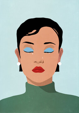 Close up woman with eyes closed crying
