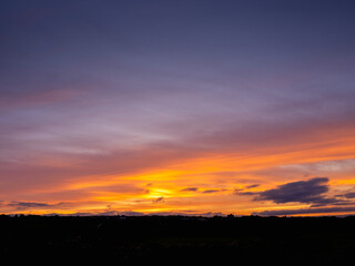 Nature scene with spectacular colorful sky. Rich warm and cool tone.