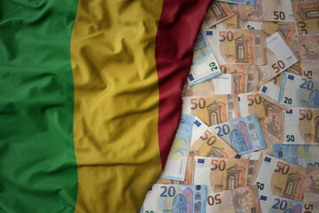 colorful waving national flag of mali on a euro money background. finance concept