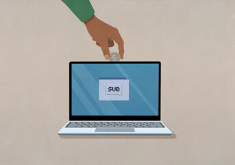 Hand inserting US coin into laptop with SUB text on screen
