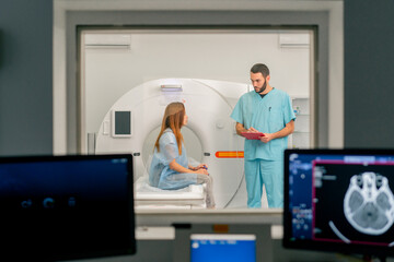 Monitors with diagnostics against the background of a doctor communicating with patient before...