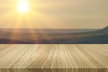 Empty blank wooden table on nature background.