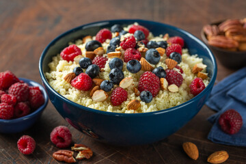 delicious couscous with fresh berry and almond © anna_shepulova