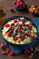 delicious couscous with fresh berry and almond