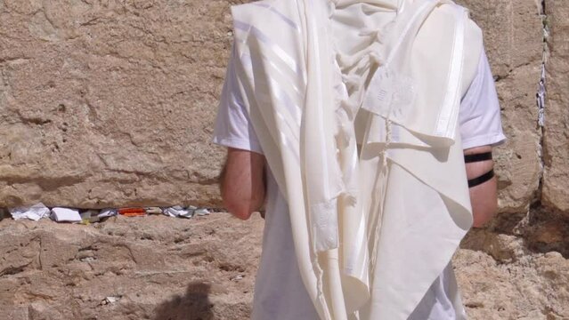 Male Orthodox Jew Praying At Western Wall, Jerusalem, Palestine, Israel - Zoom Out