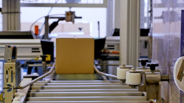 Packages on the conveyor belt in a distribution center