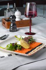 Salmon Appetizer, Carpaccio, Salmon Slices with Cream Cheese and Salad on Bright Background