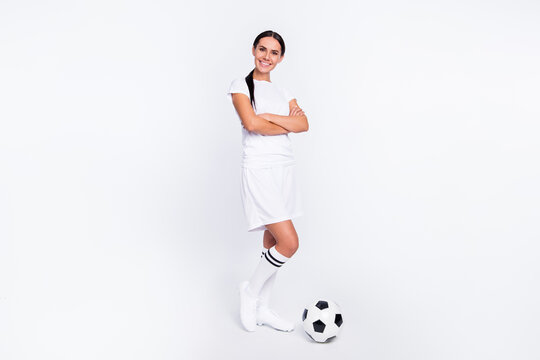 Full length photo of charming happy nice woman hold hands folded professional player isolated on grey color background