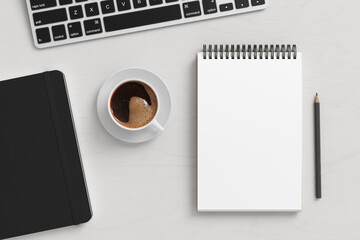 Notebook mockup. Blank workplace notebook. Spiral notepad on white wooden desk - obrazy, fototapety, plakaty