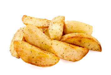 Fresh baked potato wedges with seasonings, on a white background