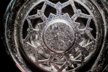  fragment of an old vinyl record player a metal pickup close-up macro