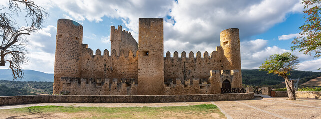 Panoramic view of the medieval castle at the top of the hill in the tourist village of Frias,...