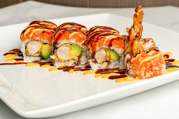sushi roll with avocado and shrimp tempura
