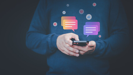Social media application chat box. Young man using a smartphone with social media, typing live chat chatting on application communication digital website and social network concept.