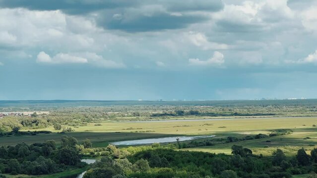 Picturesque view of the Kama River from the observation deck at the Yelabuga settlement. The movement of clouds over the river. Lower Kama National Park. Yelabuga, Republic of Tatarstan, Russia, 4K