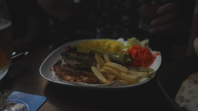 Chicken pommes steak sprinkled with red peppercorns . High quality 4k footage