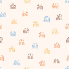 Seamless pattern with hand drawn rainbows