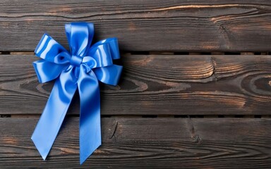 gift box with ribbon on wooden background
