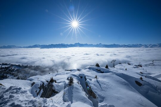 Aerial view of the snowy Cran-Montana under a sunny sky in Switzerland