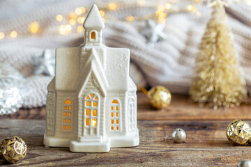 Christmas background with decorative house and holiday decor details.