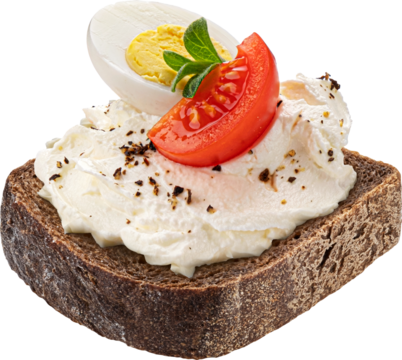 Slice of rye bread with cream cheese, tomato and egg isolated